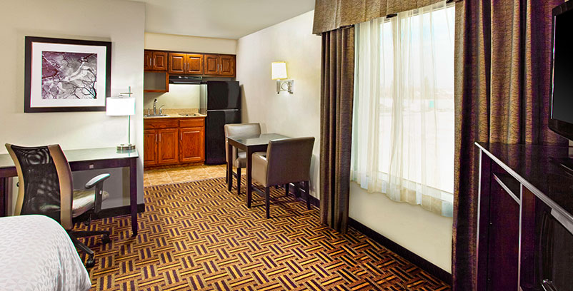 in Minot with room amenities offer microwave & mini-fridge